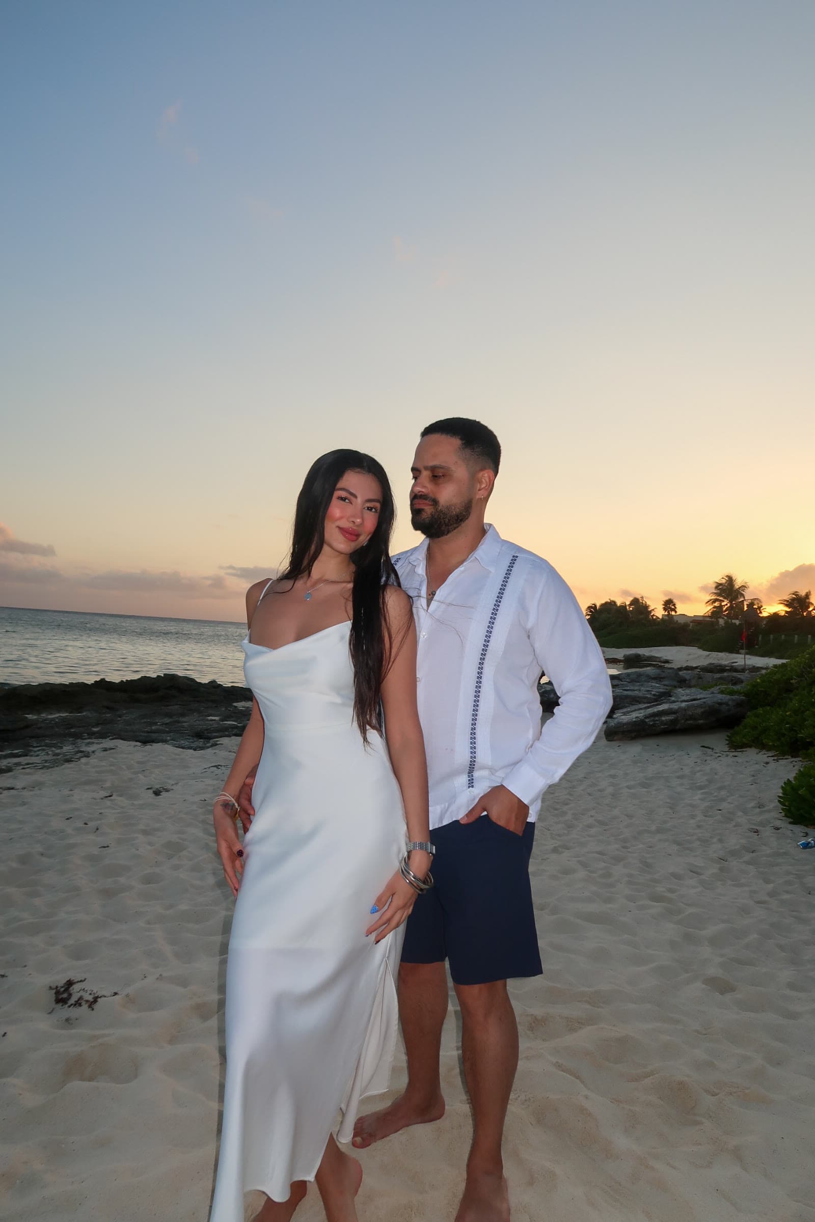 Danilo and Jotse together on the beach at sunset